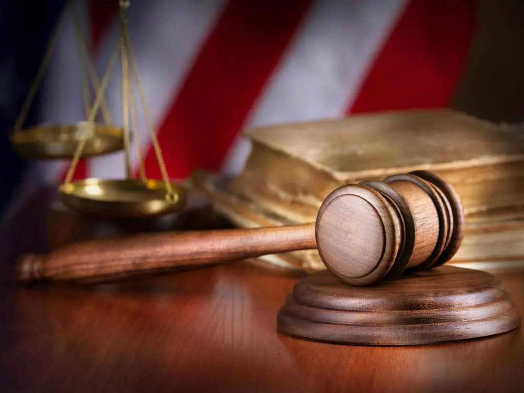 drink driving penalty A gavel and scales signifying justice in a court