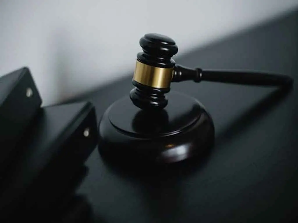 A gavel on a sound block 