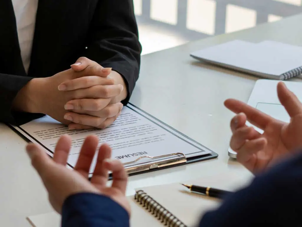An employer interviewing a job applicant
