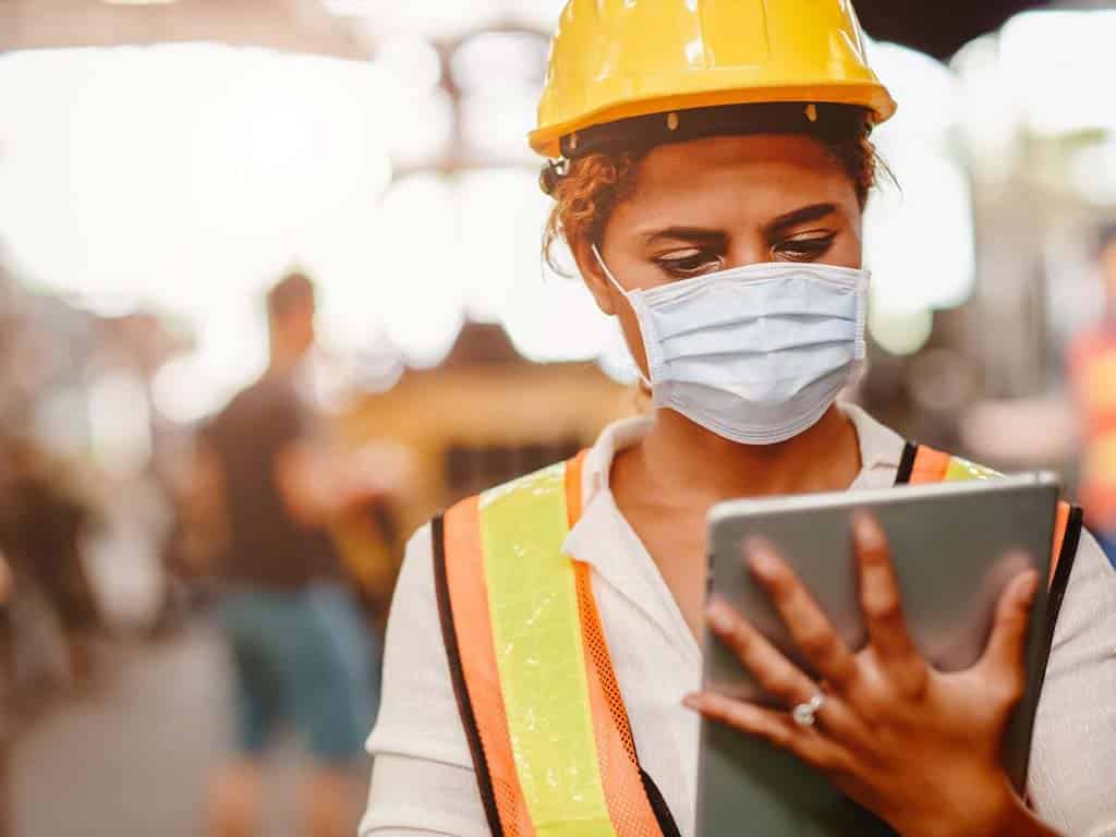 A person wearing a safety gear at workplace.