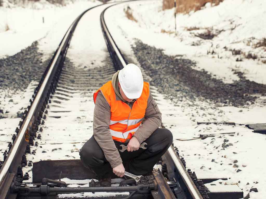 drug and alcohol testing software 2 A railway worker fixing the track