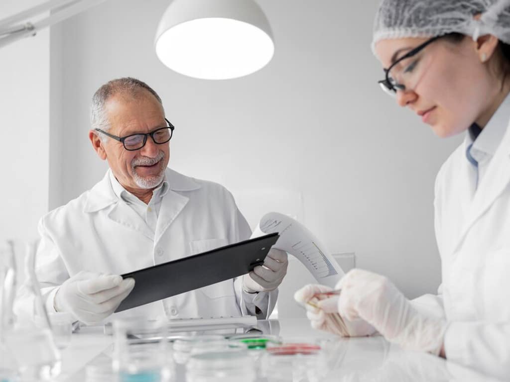 A lab technician storing the hair specimens in a vial