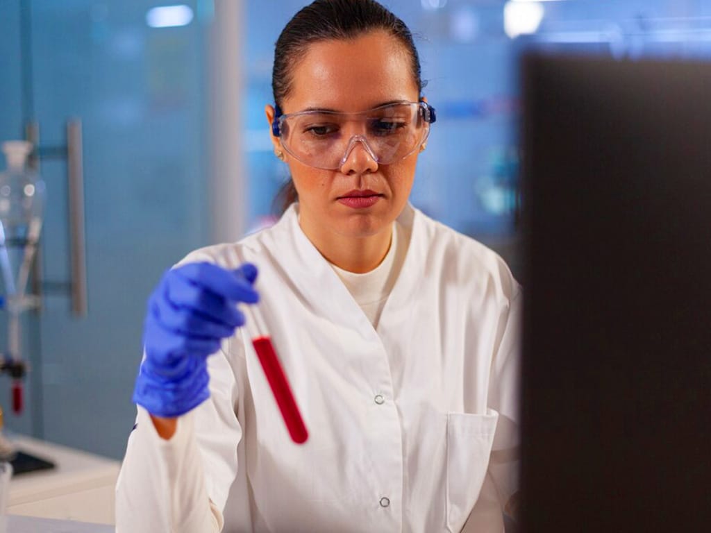 drug testing adelaide 1 1 1 A lab technician holding a vial of blood sample