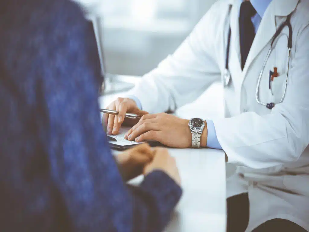 A doctor having a meeting with his patient