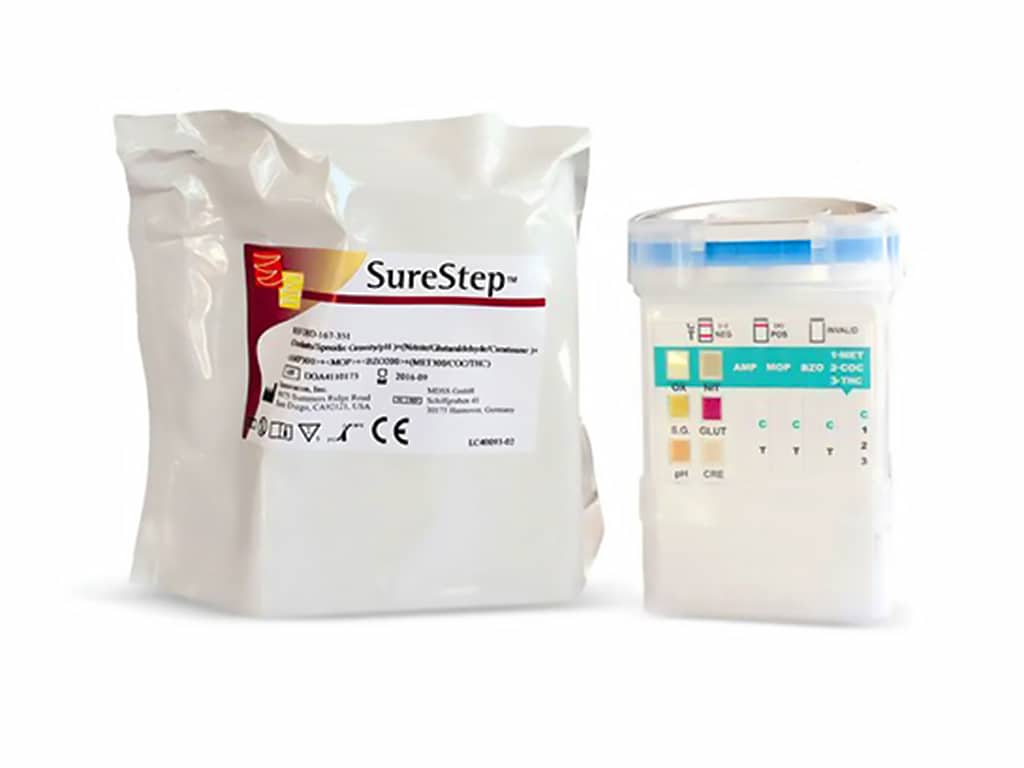 The packaging of the SureStep urine cup next to the testing device